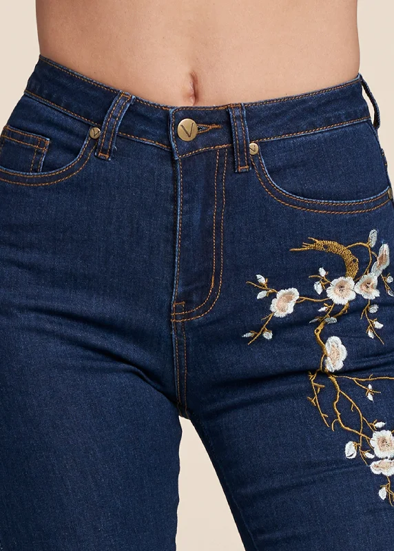 Floral embroidered skinny jeans.  - Dark Wash