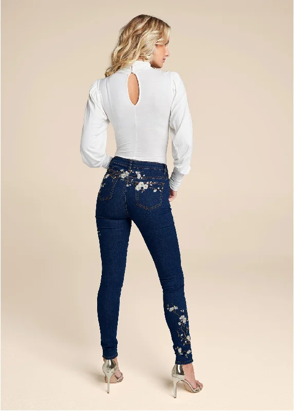 Floral embroidered skinny jeans.  - Dark Wash