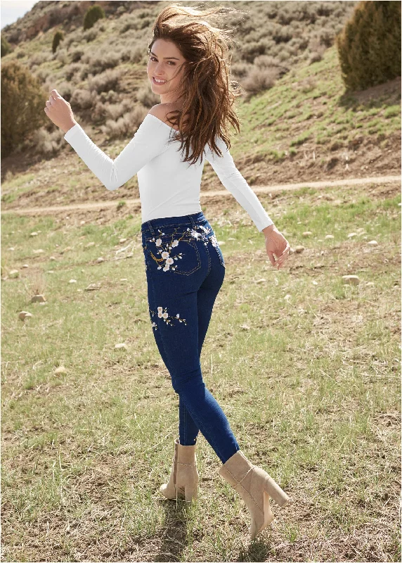 Floral embroidered skinny jeans.  - Dark Wash